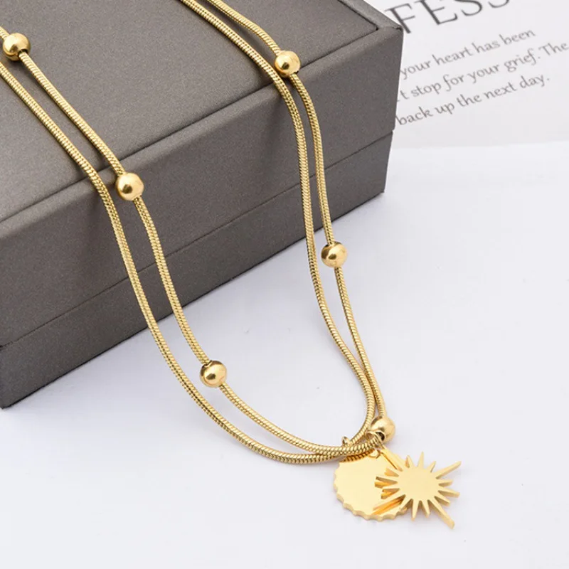 

Fashion sun titanium steel pendant necklace with a niche design multi-tiered fashion brand sweater chain jewelry