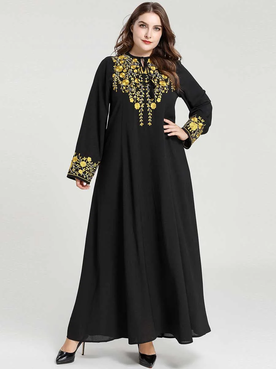 black long sleeve dress with gold embroidery