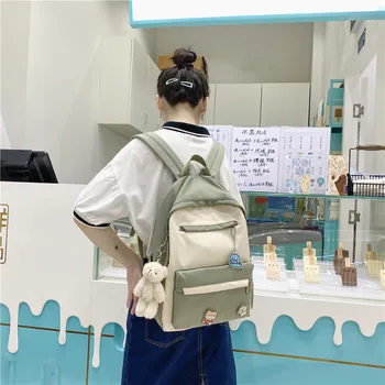 

Korean style College Students backpack Sweet girl cute brooch backpack fashion casual travel backpack men and women Shoulder Bag