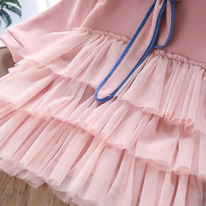 autumn new medium and small children's solid color hooded bow tie long-sleeved stitching cake mesh dress