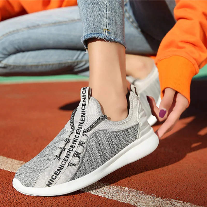 

new line of fashionable ladies' flat running shoes for students sports loafers for ladies fly knit breathable mesh shoes