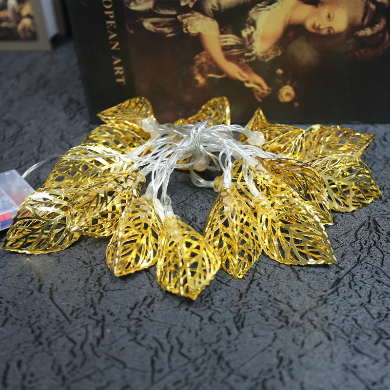 

20 Head Metal Hollow out Golden Leaf Battery Box Holiday String Light Christmas Lights LED Festival Decorative Lamp Manufacturer