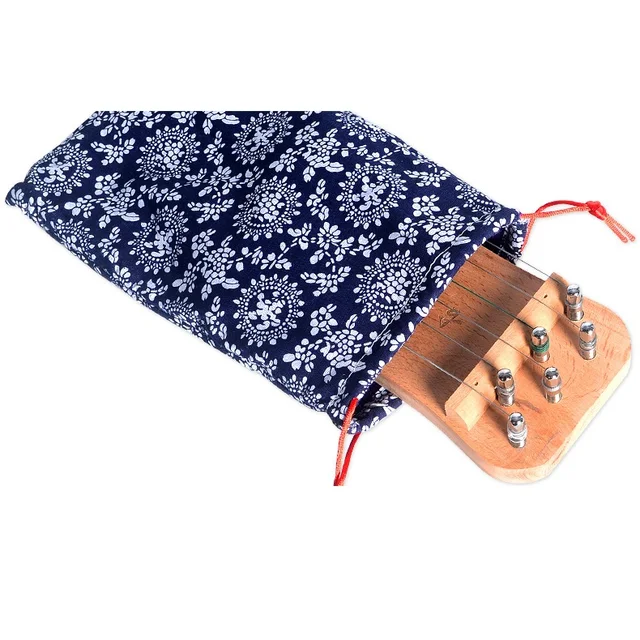 Guzheng의 매력을 친숙하고 접근 가능한 형태로 소개하는 Guzheng 손가락 손 연습기