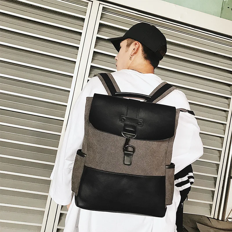 

Korean version backpack male junior senior high school students schoolbag fashion trend South Korea computer bag canvas travel
