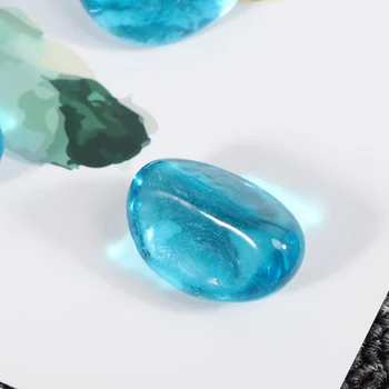 

1 Pack of 500g Aquarium Decorative Stones Fish Tank Bottom Landscape Layout Stone Ornaments (Ocean Blue - Cashew Stone)