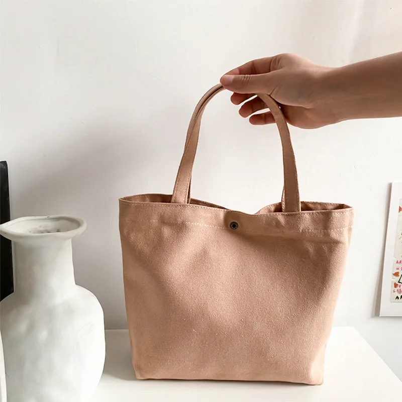 Japoneses nuevos estilo hipster lindo pequeño mano llevar estilo universitario casual simple mano llevar bolsa de lona