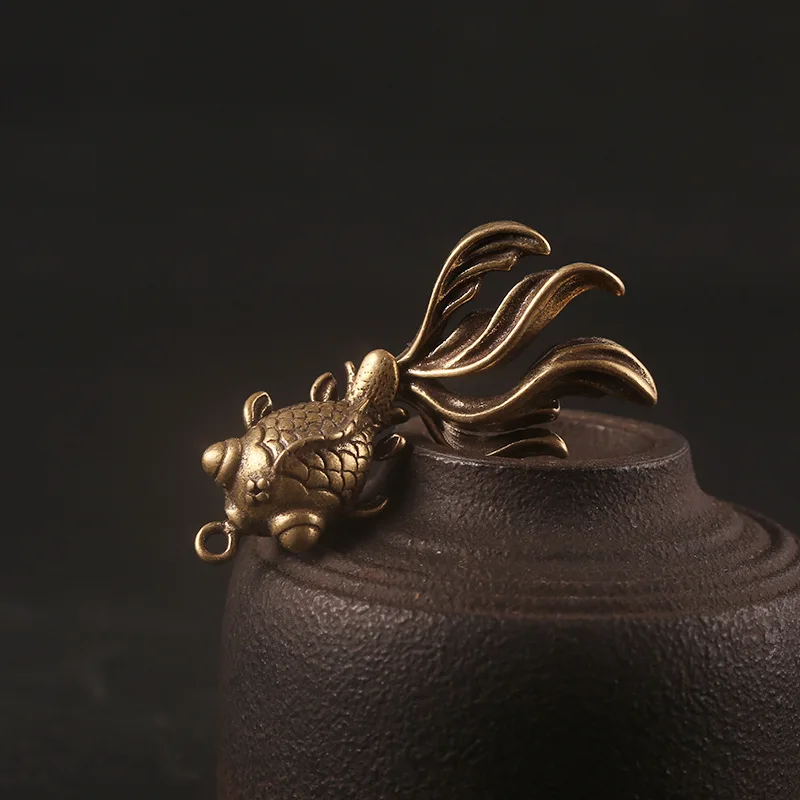 goldfish brass pendants (3)