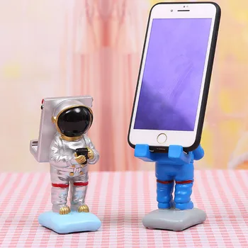 

Nordic Astronaut Spaceman Mobile Phone Stand Space Dreamer Phone Holder Resin Craft Lazy Stand Home Decoration Birthday Gift