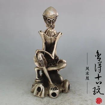 

Bronze statue of arhat with silver plated thin bone