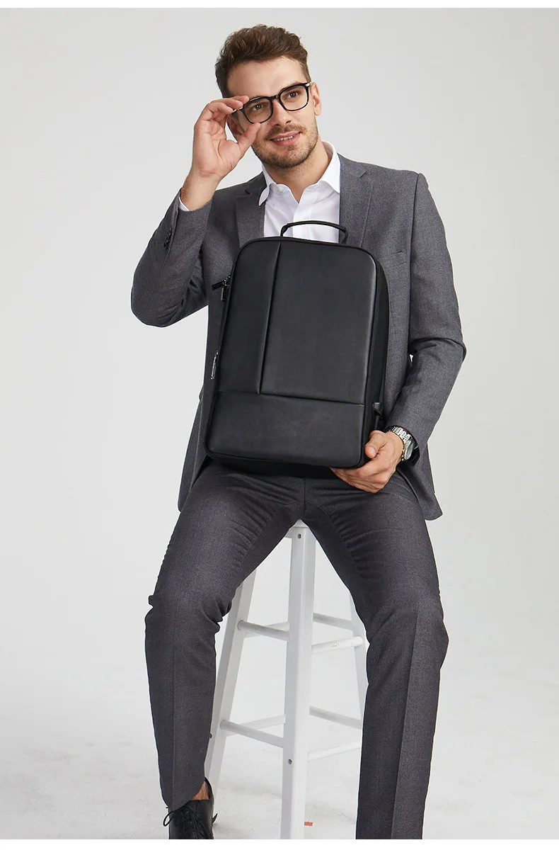 Large-capacity business solid color backpack male pu shoulder computer bag multi-function men's travel backpack leather backpack