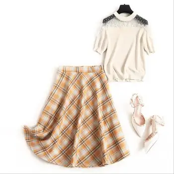 

New European and American women's dresses for spring 2020 Knit T-shirt with short sleeves Plaid skirt Fashion suits