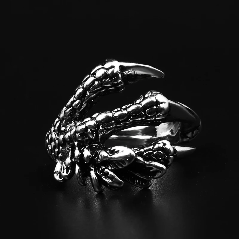 

Men's ring alloy index finger anti-body concealed weapons to the eagle dragon claw opening to adjust the over-air ring