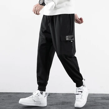 

Spring and autumn new large size men's tide fat fat guy loose and fat increase elastic leisure sports beam mouth guard pants 6x