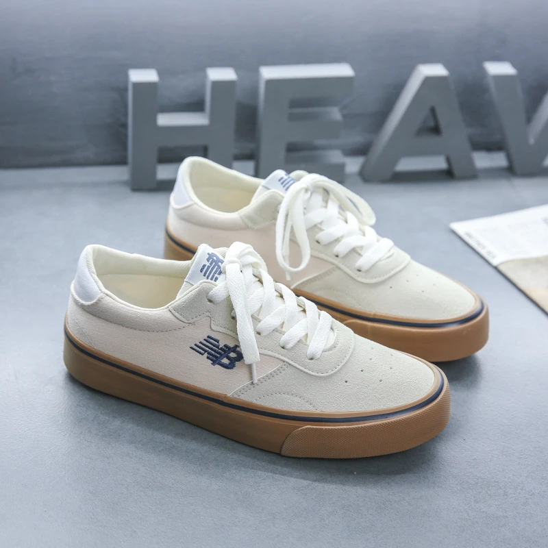 cream colored canvas shoes