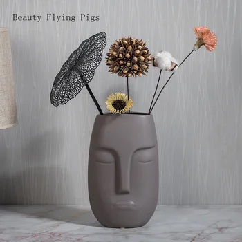 

Direct selling cool beauty flower arrangement brown human face matte black vase creative home decoration vase decoration