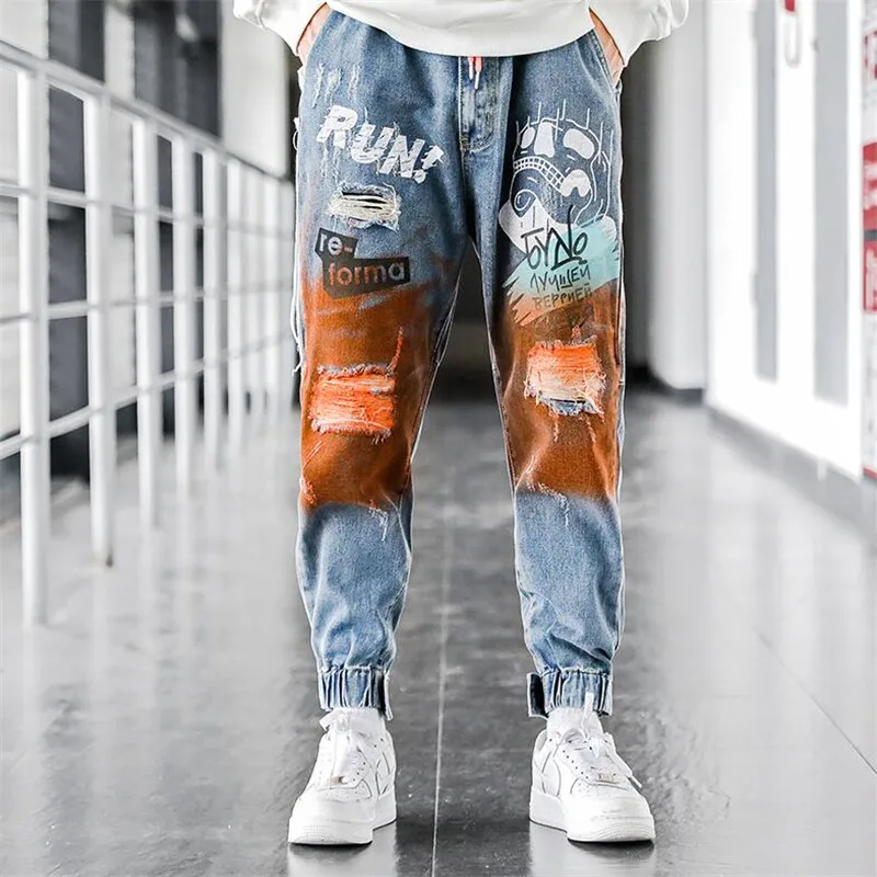 

2020 hip-hop jeans men's ripped holes autumn new loose feet loose wild print hit color street trend casual pants
