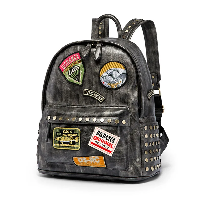

New rivet backpack men's and women's badge backpack simple fashion waterproof leisure travel backpack