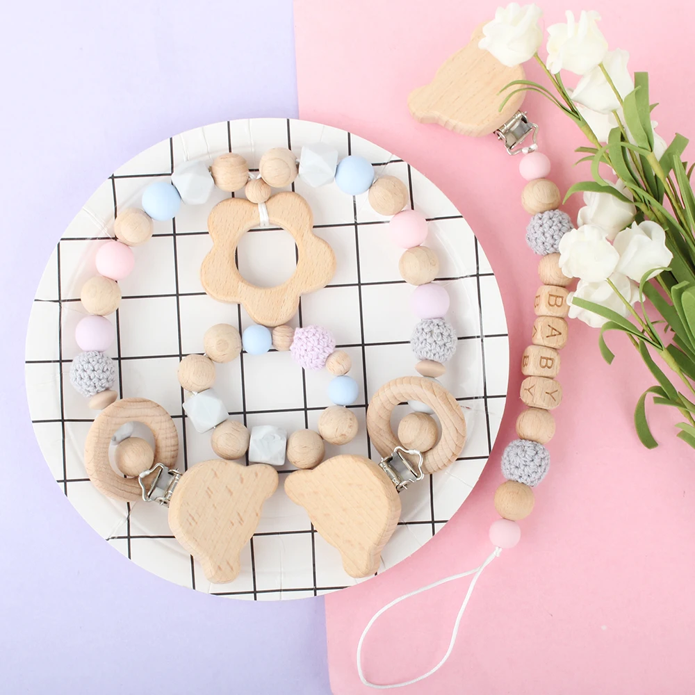 

Wooden Mobile Pram Dummy Clip Chew Silicone Crochet Beads Baby Wood Rattle Bracelet Teether Personalized Baby Pacifier Chain