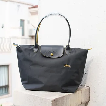 

2020 High Quality Designer Long Handle Large Capacity Embroidered Dumpling Bag Waterproof Commuter Bag Handbag Nylon Canvas Bag