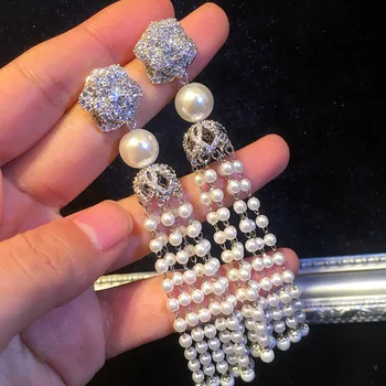 

2019 new woman pendant tassel earrings pearl rose earrings s925 silver needle jewelry long section banquet party stainless steel