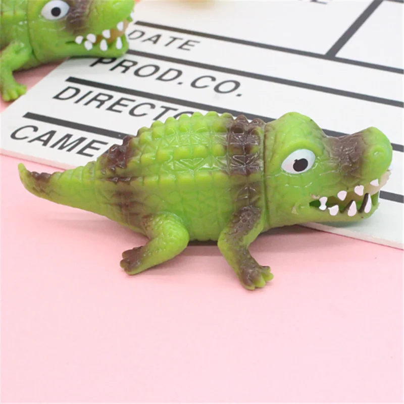 Realistic decompression squeezing music toy tidy funny simulation vomiting crocodile squeaking music venting decompression toy 1 Realistic decompression squeezing music toy tidy funny simulation vomiting crocodile squeaking music venting decompression toy 5