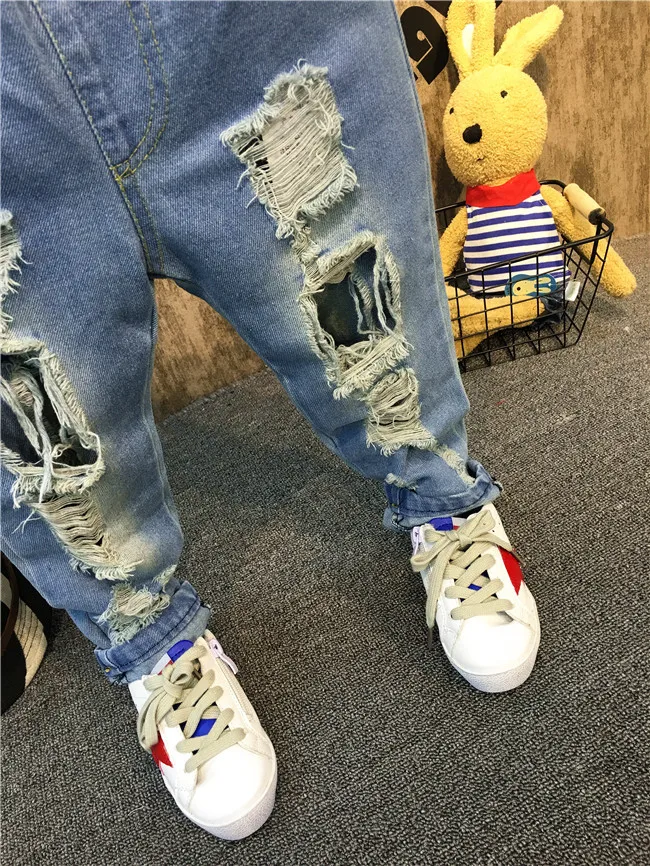 

Wenzhou Childrenswear Spring New Style BOY'S Girls Korean-style Versatile Cool with Holes Jeans