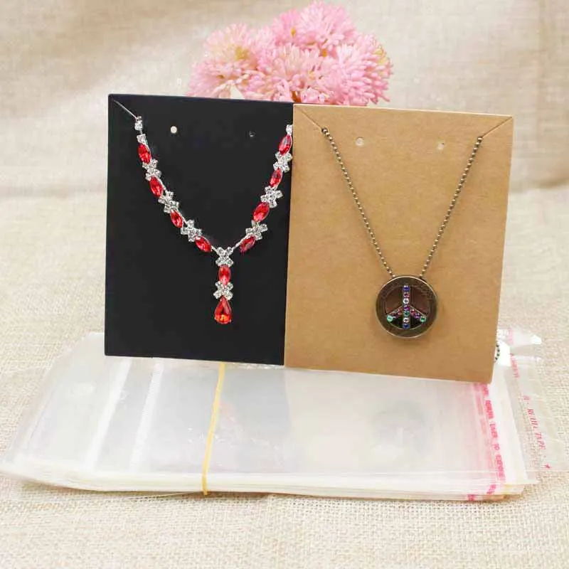 

9.5*7.50cm 2018 hot sale new blank paper jewelry set card necklace with earring display card 100pcs+100 match bag
