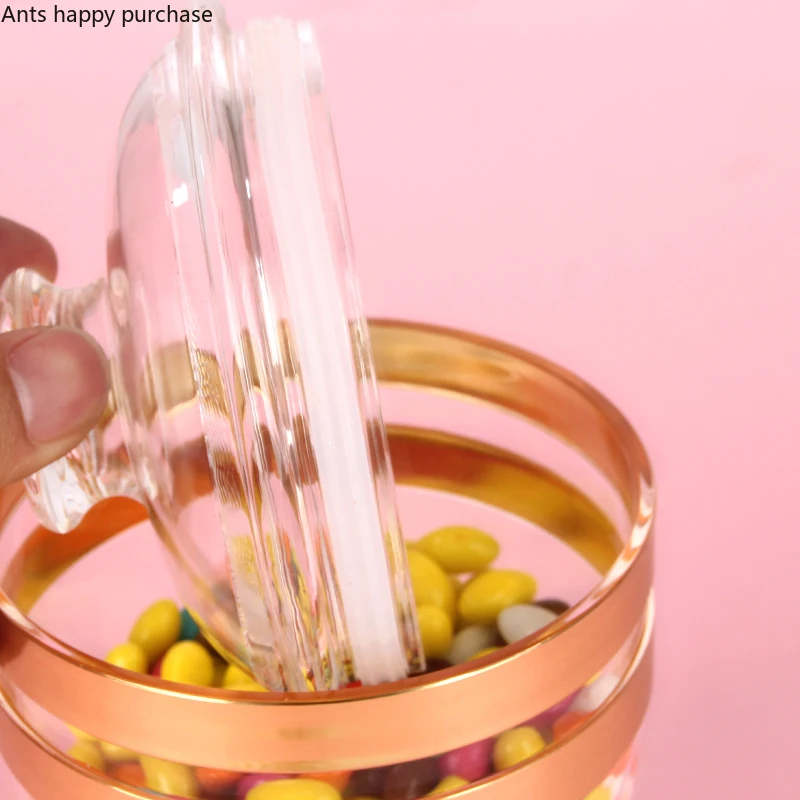 https://ae01.alicdn.com/kf/Hd09f88263a31441e8b5b708975f3fa7aY/European-style-Transparent-Acrylic-food-Candy-jar-With-lid-Decoration-home-plastic-storage-jar-Wedding-Decoration.jpg