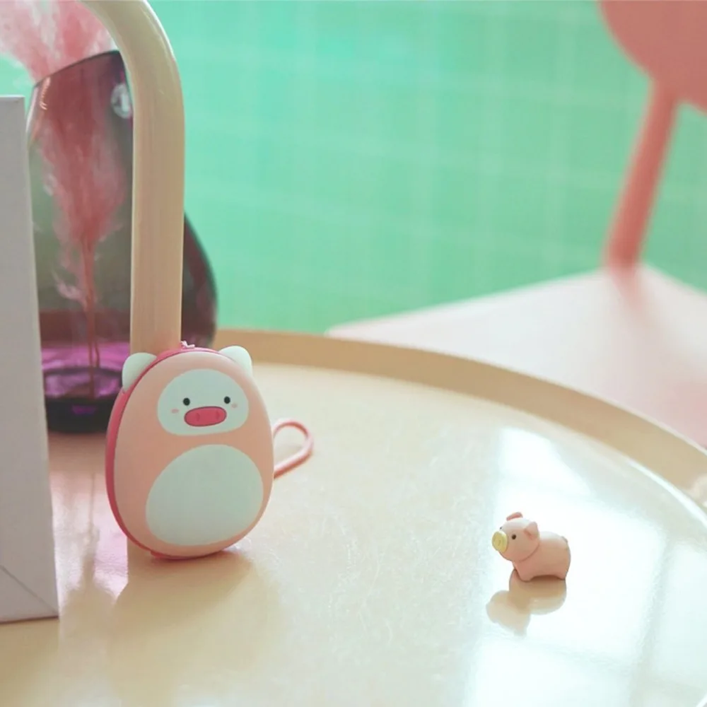Cute mini USB charging with mobile power beauty year pig warm hand treasure regular
