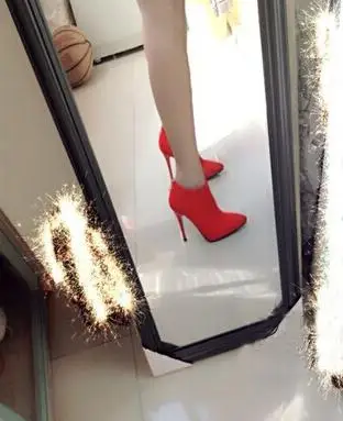 

Classic versatile ankle boots with long, elegant, pointed, glossy heels free shipping