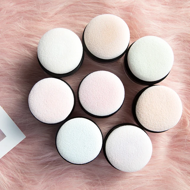 poudre libre avec tête de champignon, fond de teint longue durée