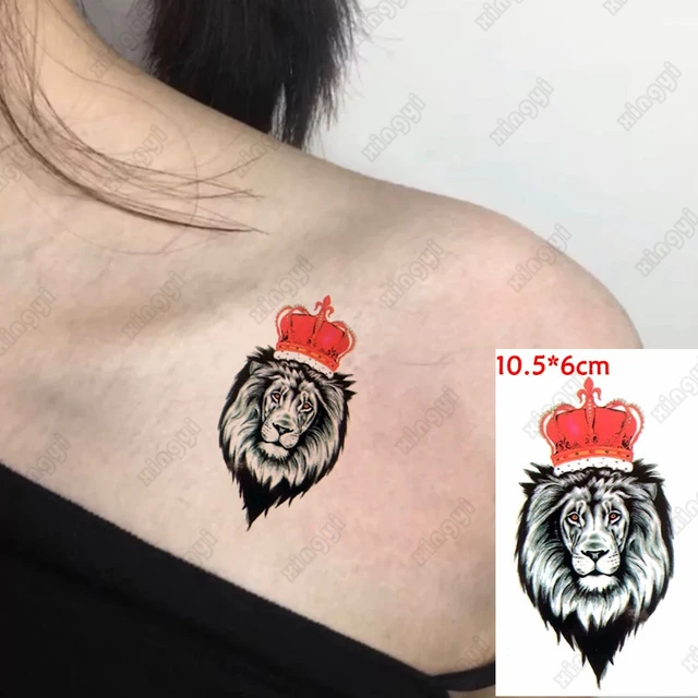 Lion Head With Crown Tattoo