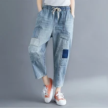 Новинка года; сезон лето; узкие джинсы с эластичной резинкой на талии; свободные карманы с дырками; джинсы Harlan; большие размеры; женские