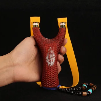 

High quality red sandalwood slingshot CNC copper head red sandalwood new outdoor solid wood flat leather slingshot