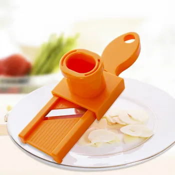 

Japan Quality Candy Color Kitchen Accessories Plastic Garlic Slice Grinding Tool Magic Silicone Peeler Slicer Cutting Machine