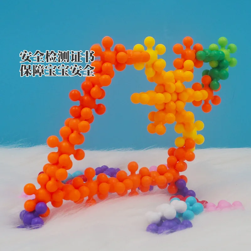 

Multi--Plastic Building Blocks Assembled Fight Inserted Large Particles Toy cong ming bang Snowflake Kindergarten