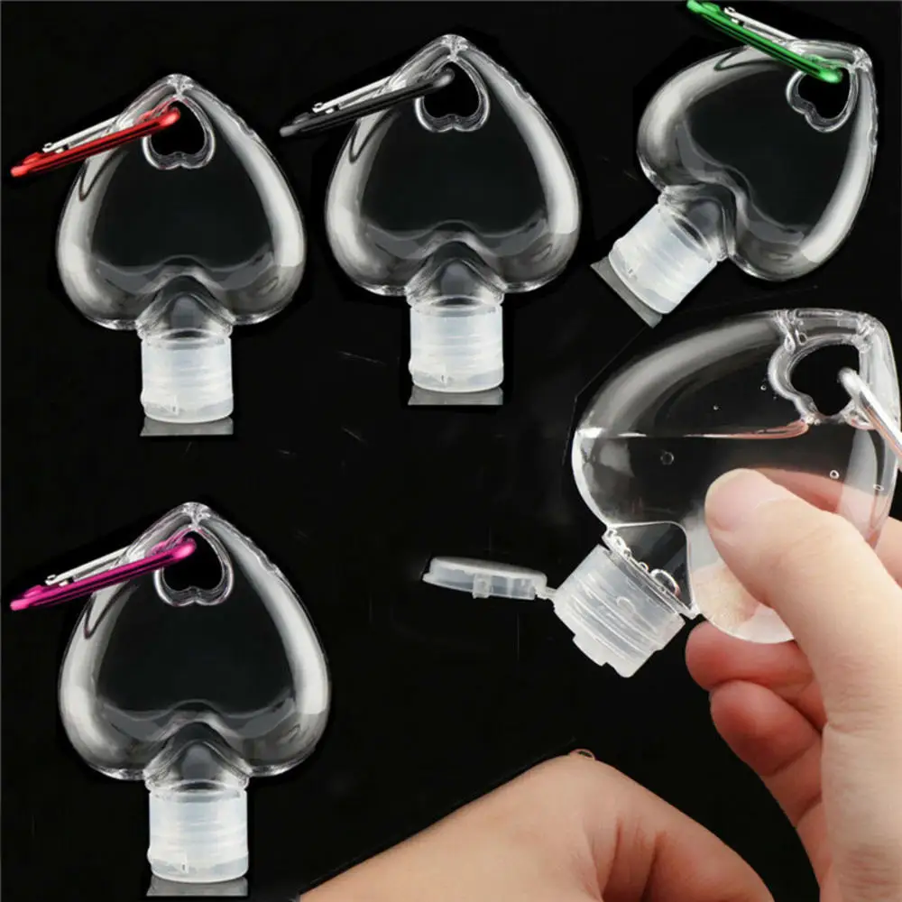 

50ml Portable Heart Shape Empty Refillable Bottle With Key Ring Hook Travel Hand Sanitizer Bottle Hook Keychain Carrier