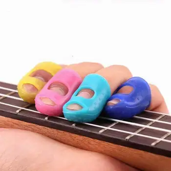 

500pcs Silicone Guitar Thumb Finger Picks Protector Plectrum Fingertip thimble Finger Guard safety protect caps Colors Random