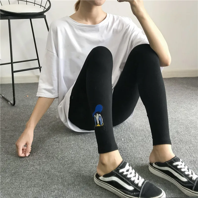 

Girl cartoon Donald Duck embroidered leggings women's outer wear cotton high-waist slim-fit nine-point pants Harajuku style