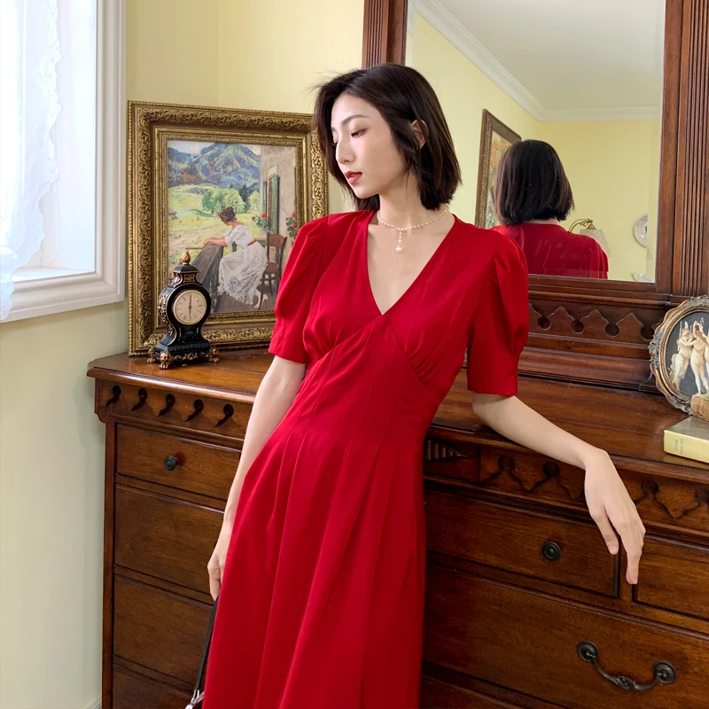 

Film grain branch characteristics of French dress female temperament accept waist show thin hubble-bubble sleeve v-neck white li