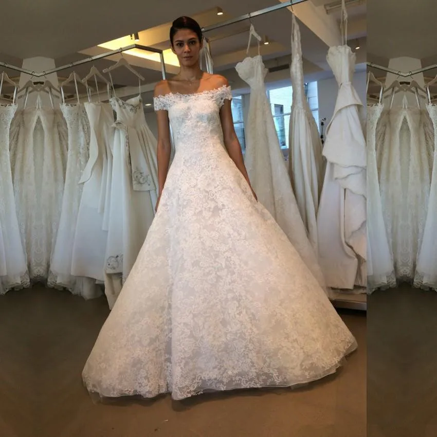 newest-cap-sleeve-lace-a-line-wedding-dresses-chapel-train-button-back-beach-bridal-wedding-gowns-robe-de-mariage-bridal-dresses_副本