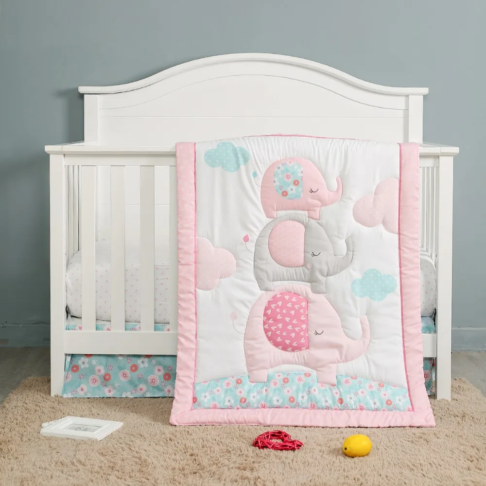 white cot bed bedding
