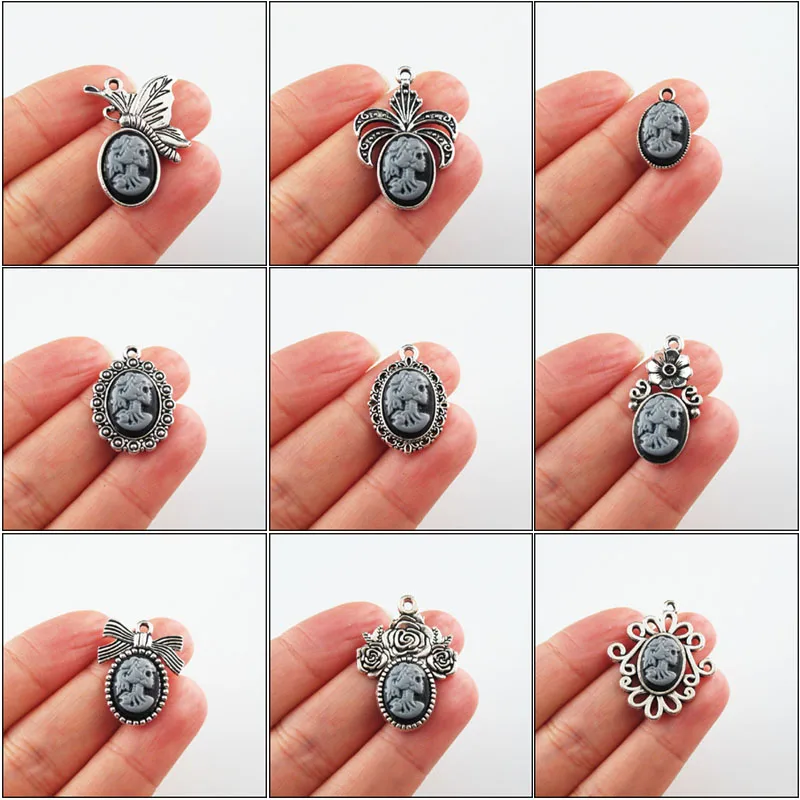 

Fashion Tibetan Silver Plated Beauty Oval Frame Butterfly Animal Flower Resin Charms Pendants
