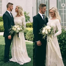 

2020 Elegant Ivory Bohemian Wedding Dresses Long Sleeves A Line Jewel Neck Appliques Garden Wedding Dress Floor Length Gowns