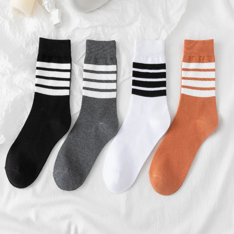 

4 Pairs Autumn Winter Asymmetry Of Cotton tube Ladies men Socks Harajuku Designer Warmth Woman Standard Short Crew Sox
