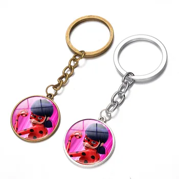 

Miraculous Ladybug Keychain Cute Movie Cabochon Glass Girl Car Key Chains Girl Bag Pendant Keyring Friend Holiday Gifts