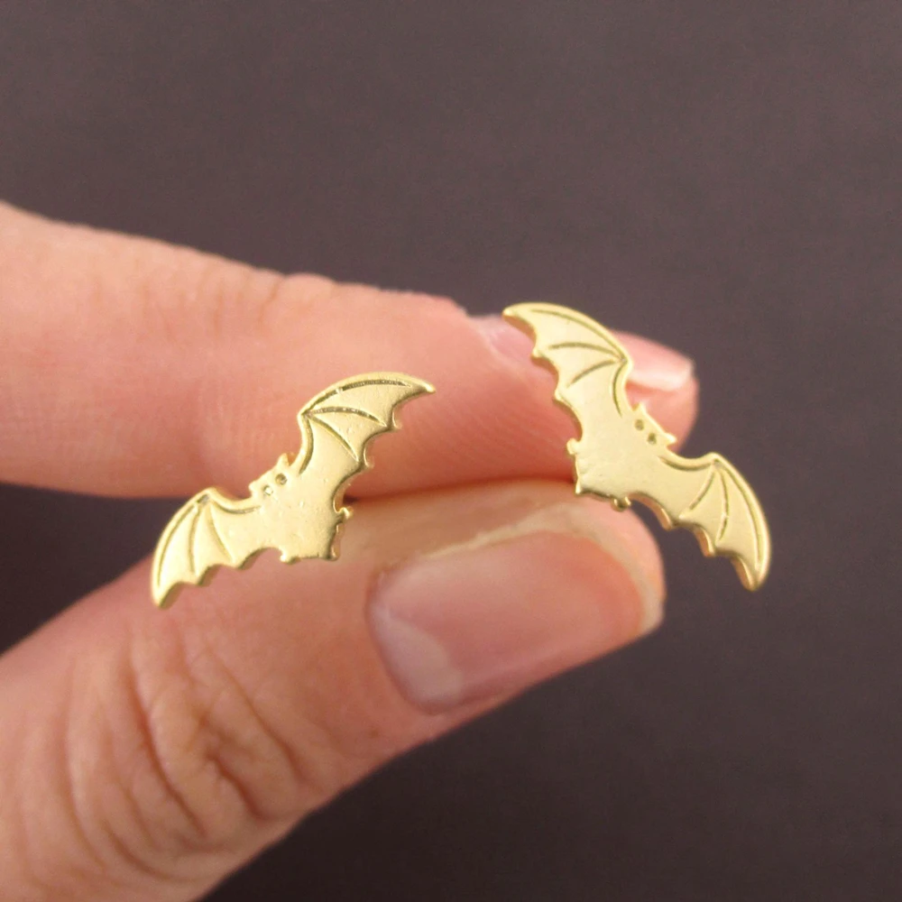 bat-with-spread-wings-silhouette-shaped-stud-earrings-in-gold_1500x