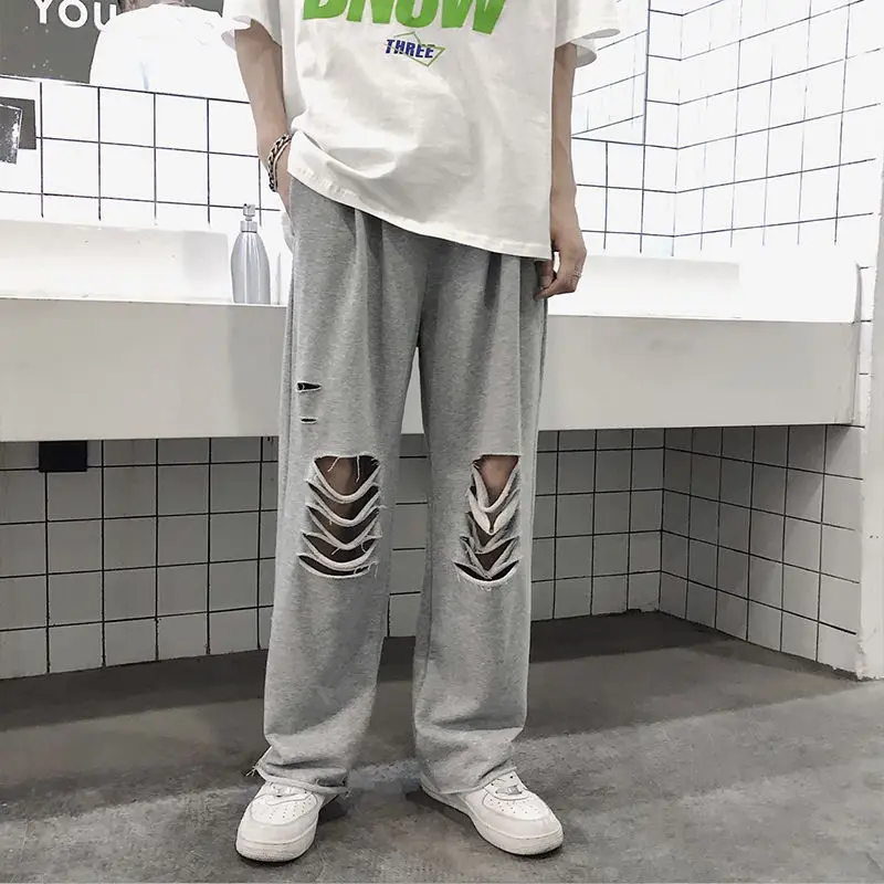 

Men's ripped casual pants 2020 summer and autumn new students nine points ripped pants young people fashion trend men's clothing