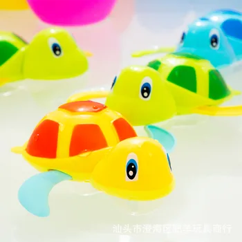 

Child Playing With Water Toys Bathing Swimming Little Turtle