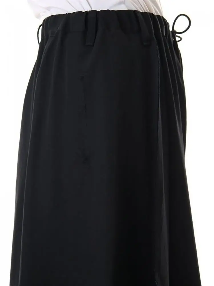 Men's new casual wide-leg pants culottes irregular asymmetric button design of urban youth fashion black